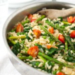 Risotto with Spinach, Asparagus, Peas, and Tomatoes | tamingofthespoon.com