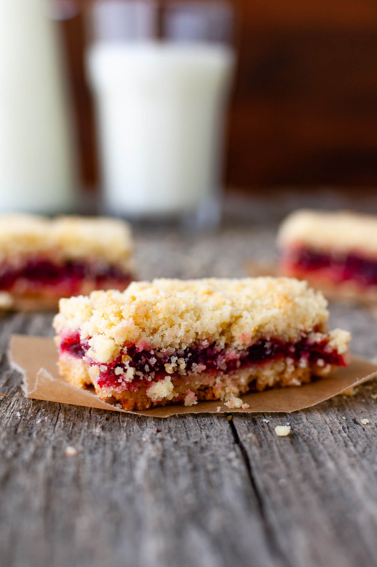 Close-up of a cranberry orange crumb bar.