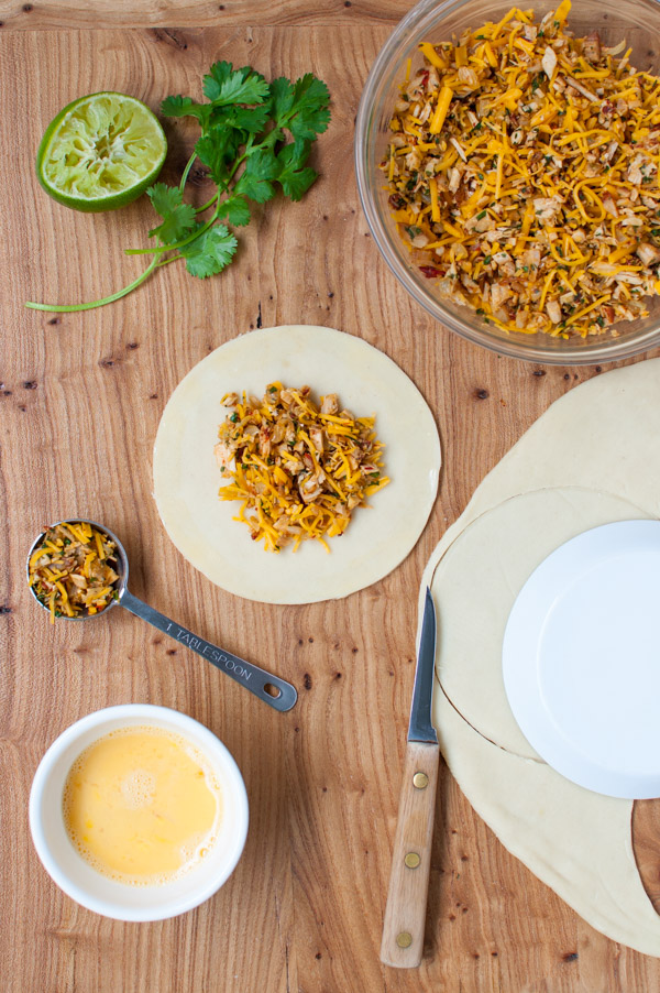 Empanada filling on a circle of dough.