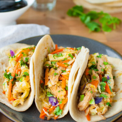 Mu shu chicken and sautéed vegetables in some flour tortillas.
