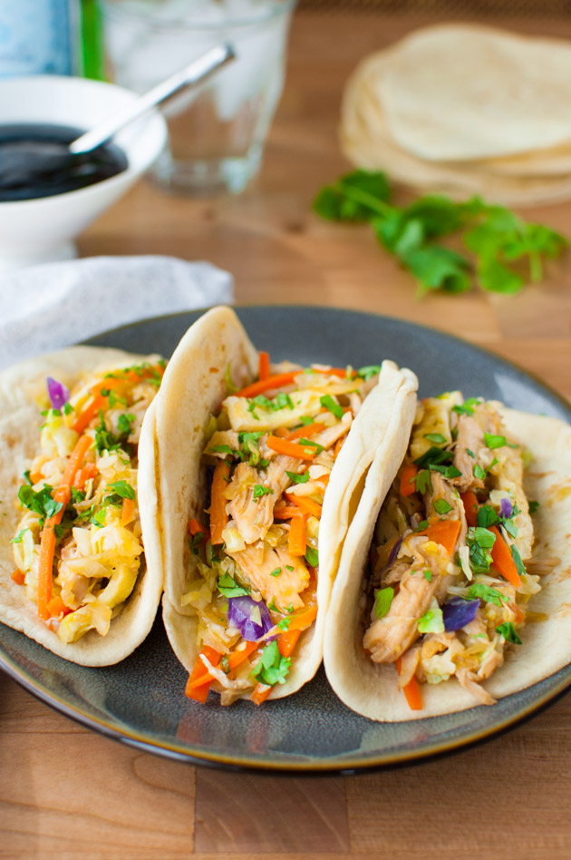 Mu shu chicken and sautéed vegetables in some flour tortillas.