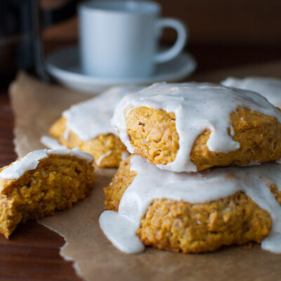 Pumpkin Scones with Vanilla Glaze - These scones don't require any kneading, rolling, or cutting. They get scooped out with an ice-cream scoop for a mess free morning treat.| tamingofthespoon.com