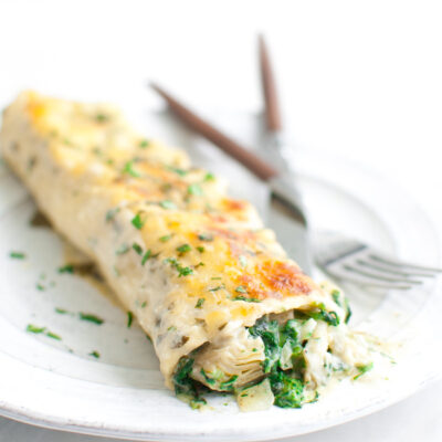 Spinach and Artichoke Enchiladas | tamingofthespoon.com