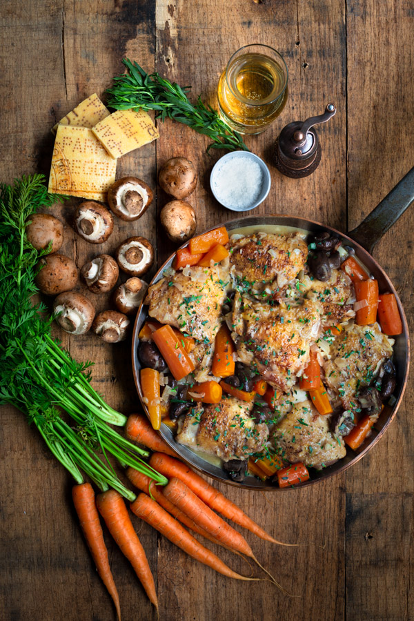 Creamy Chicken in White Wine Sauce - Braised chicken in a creamy tarragon white wine sauce with mushrooms and carrots - a complete dinner in one-pot!