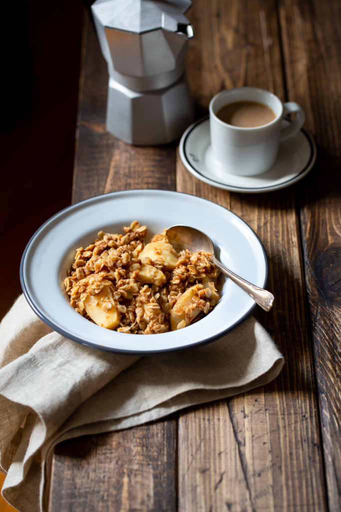 Breakfast Apple Crisp - Sliced apples baked with a crunchy topping of oats, maple syrup, and brown sugar. It's a cozy, healthy way to start your day.