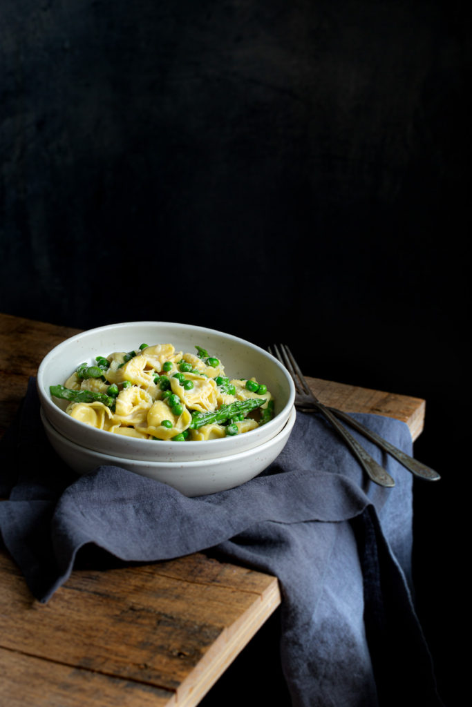 Easy Tortellini Carbonara with Peas and Asparagus - the easiest pasta carbonara ever. You only need 6 ingredients, 1 pan, and 20 minutes.