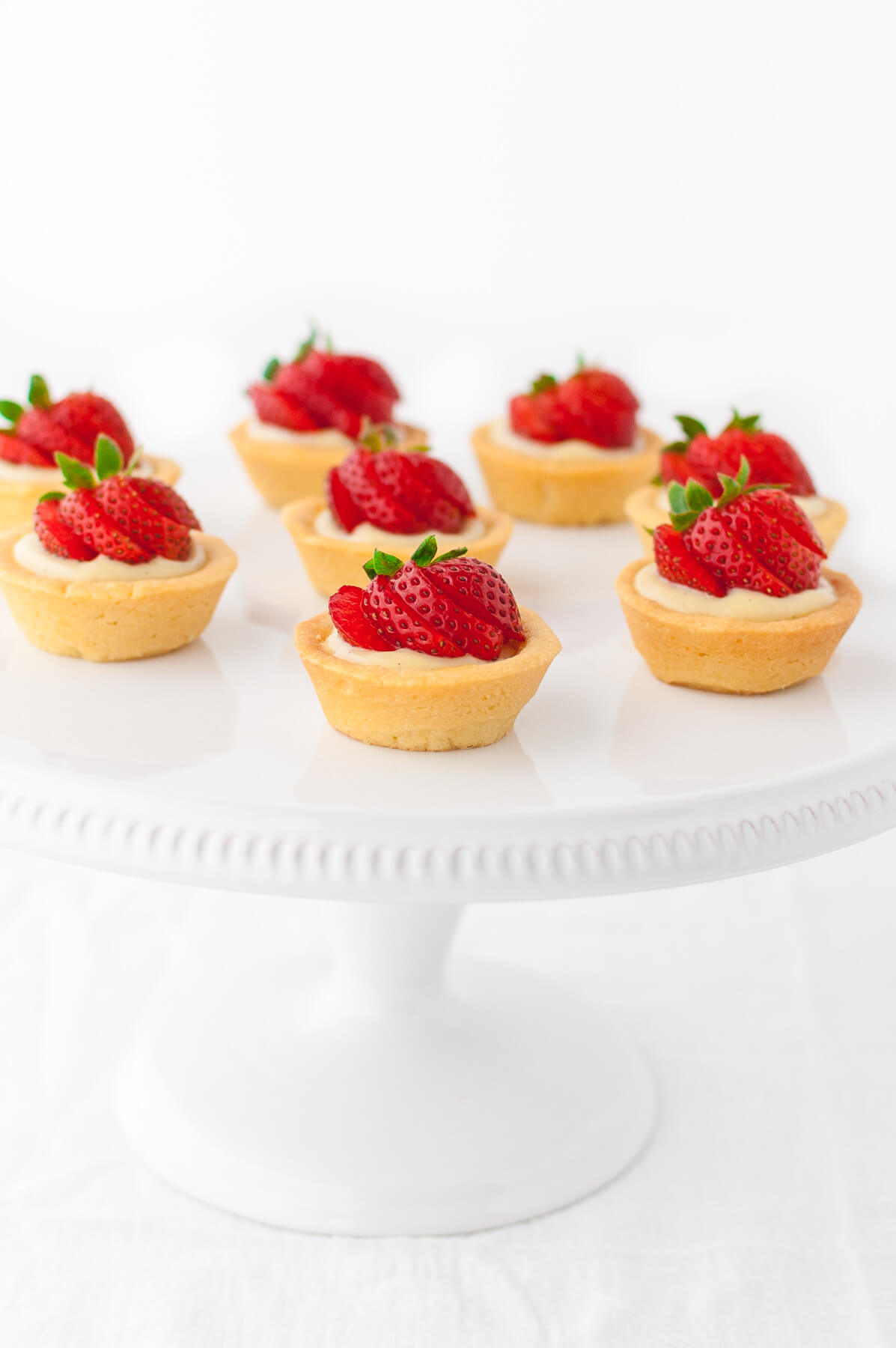 The Pampered Chef Cup Slicer cutting fresh strawberries 