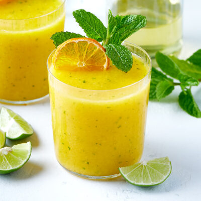 Close-up of frozen mango mojito.