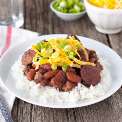 Red beans and rice topped with grated cheese and green onions.