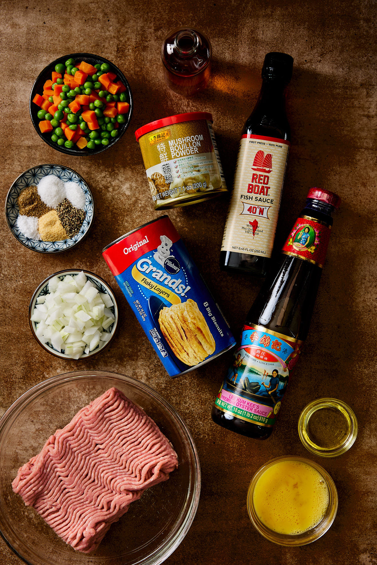 Ingredients for making paté chaud on a brown background.